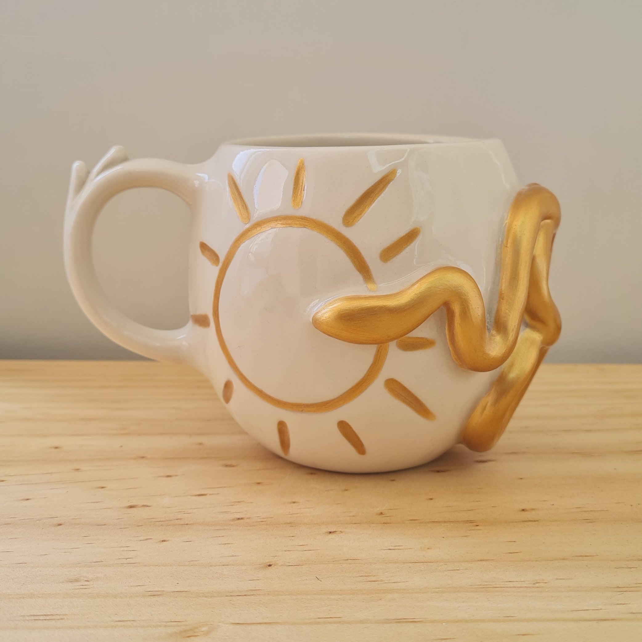 Taza Sol Serpiente Dorada