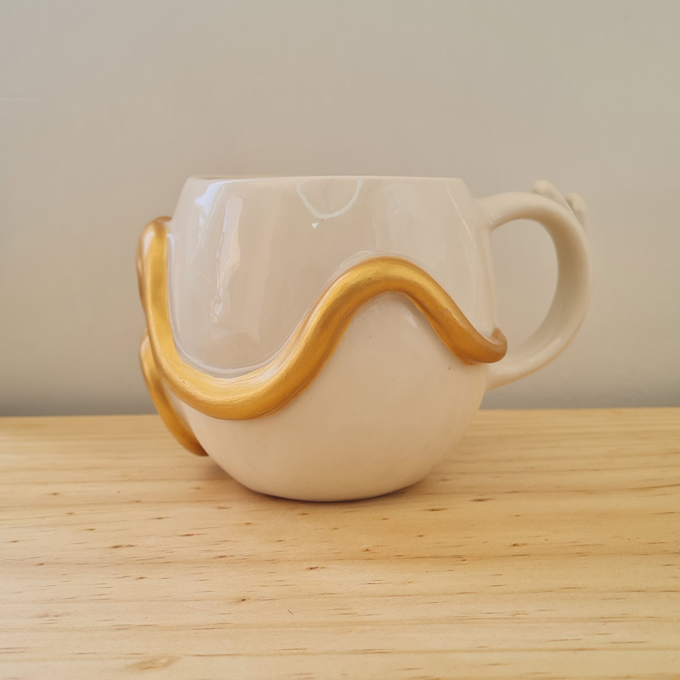 Taza Sol Serpiente Dorada