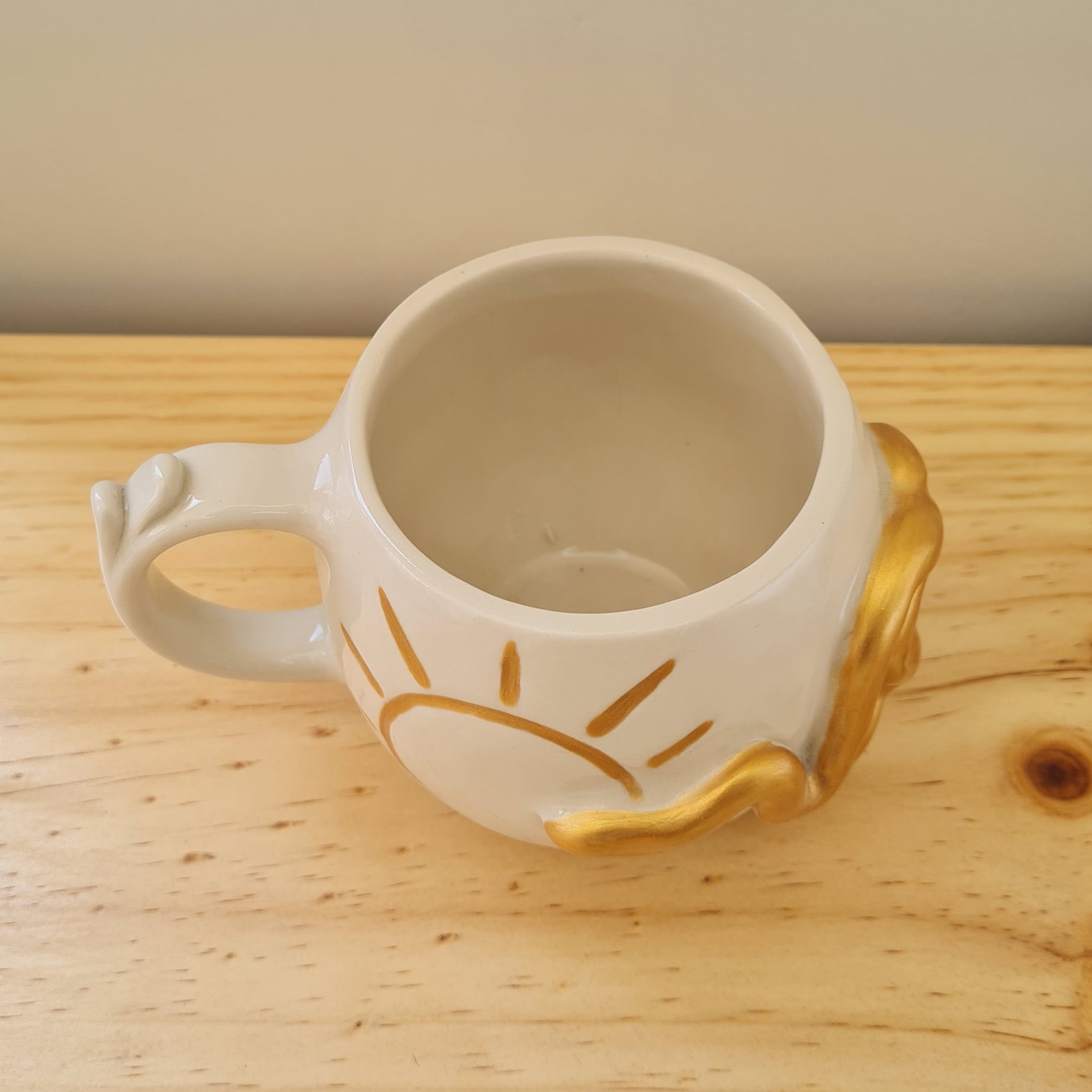 Taza Sol Serpiente Dorada